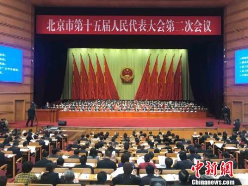 北京市十五屆人大二次會議14日開幕。北京市長陳吉寧向大會作政府工作報告?！∫?攝